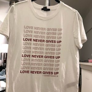 Love Never Gives Up Graphic Tee